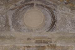 East porch roundel depicting Poyntz arms, conserved by NT